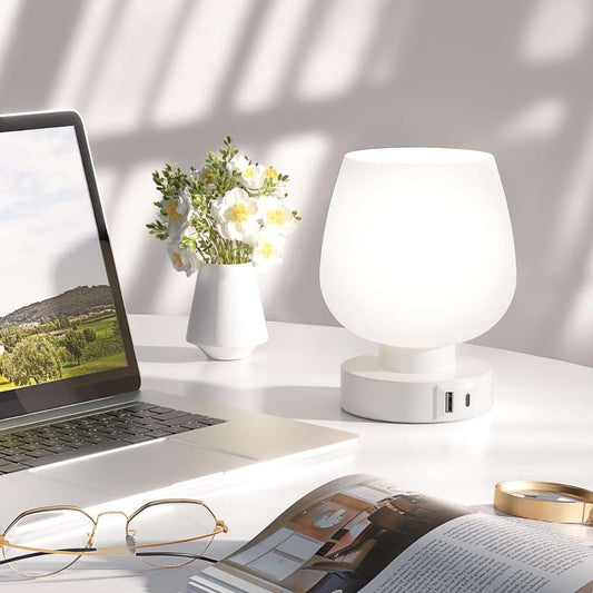 Kakano bedside lamp with glass shade